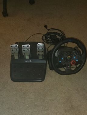 Logitech Black Racing Wheel and Silver Pedals